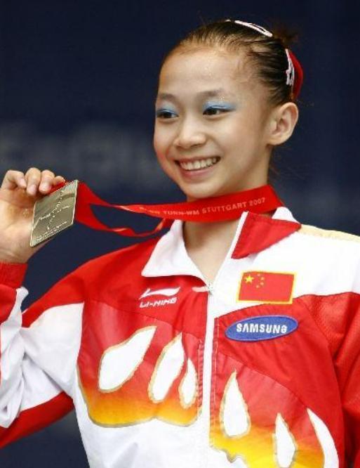 奥运冠军杨伊琳，退役后二次发育成女神，老公1米9身材很健硕(5)