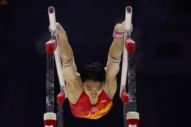 体操世锦赛资格赛日本领跑男团 中国队失误不断(2)